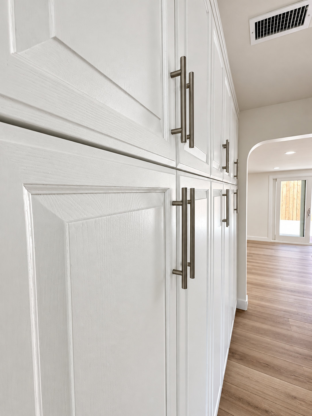 White cabinets with metal handles